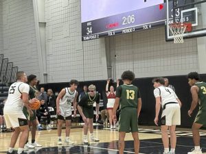 Upper St. Clair’s Ryan Robbins shoots a free throw against Belle Vernon on Friday. (Don Rebel | TribLive)