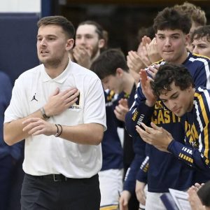 Norwin head coach Cam Auld reacts with his team after the Knights scored against Penn-Trafford on Dec. 2, 2025, at Norwin. (Christopher Horner | TribLive)