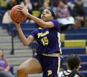 Plum’s Tamia West scores against Kiski Area on Monday, Dec. 8, 2025, at Kiski Area. (Christopher Horner | TribLive)