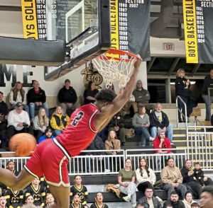 New Castle's Damien Harrison dunks against Montour on Tuesday, Dec. 9, 2025. (Antonio Rossetti | For TribLive)