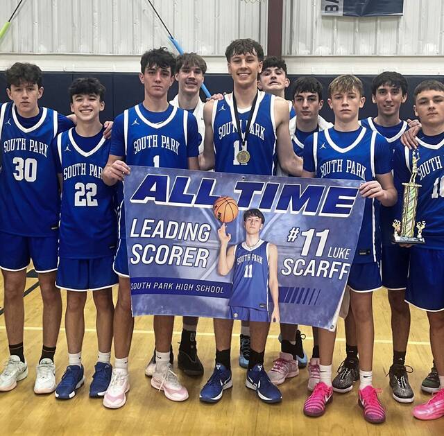 Teammates celebrate Luke Scarff becoming South Park’s all-time leading scorer. (Submitted)