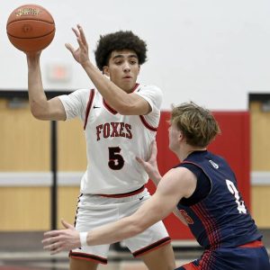 Fox Chapel’s John Rehak works against Shaler’s Zach London last season. (Christopher Horner | TribLive)