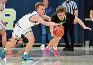 Franklin Regional’s Logan Walter (left) steals the ball from 
Penn-Trafford’s Orlando DeOrio. (Chaz Palla | TribLive)