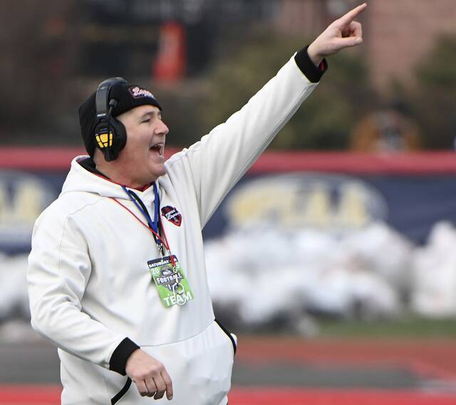 Avonworth head coach Duke Johncour celebrates after the Lopes scored during the PIAA Class 3A state championship game against Northwestern Lehigh on Saturday, Dec. 6, 2025, at Cumberland Valley. (Christopher Horner | TribLive)