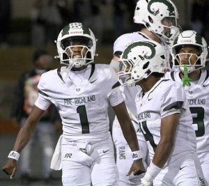 Pine-Richland quarterback Oobi Strader celebrates his second quarter touchown with Jay Timmons during their game against Central Catholic on Friday, Aug. 29, 2025, at CMU. (Christopher Horner | TribLive)
