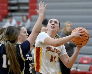 North Catholic’s Sam Weir drives to the basket against Freeport on Monday, Dec. 15, 2025, in Cranberry. (Christopher Horner | TribLive)