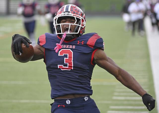 McKeesport running back Kemon Spell celebrates after taking it to the house on the first offensive play for McKeesport against Aliquippa during the WPIAL 4A football championship Saturday Nov.15, 2025 at Pine-Richland High School. (Chaz Palla | TribLive)