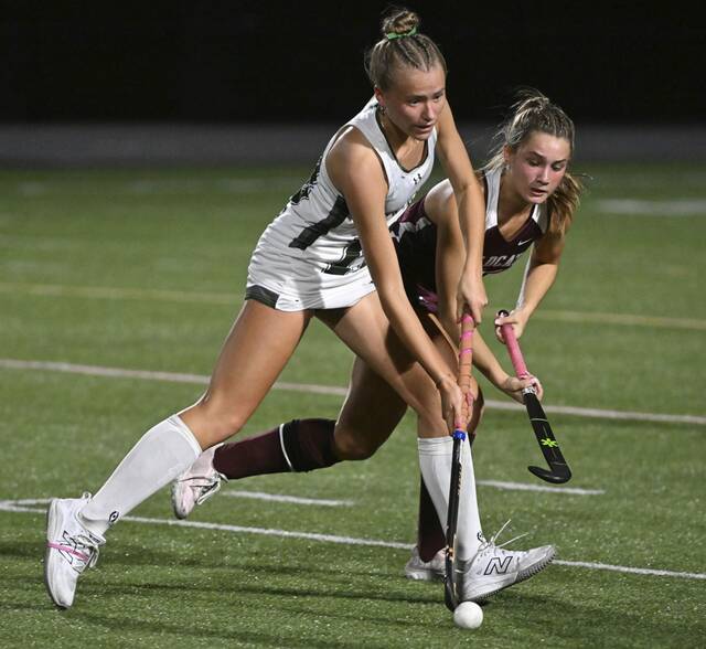 Pine-Richlands Anna Merlack works against Mechanicsburgs Kate Engle during during a PIAA Class 4A playoff game Nov. 5, 2024. (Chaz Palla | TribLive)
