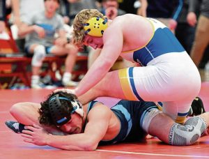 Derrys Brady Brown beats Burrells Isaac Lacinski at 189 pounds during the WPIAL Class 2A team championship Feb. 1. (Chaz Palla | TribLive)