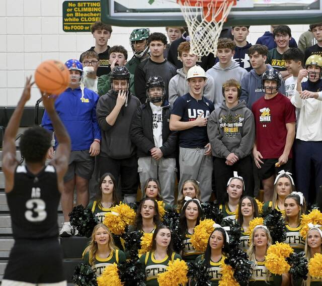 The Penn-Trafford student section watches as Albert Gallatin’s Mekhi Belt shoots a free throw on Tuesday, Dec. 16, 2025, at Penn-Trafford. (Christopher Horner | TribLive)