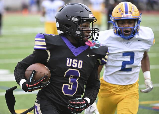USOs Zion Hauser runs to the end zone during the City League championship game Oct. 25, 2025 at Cupples Stadium. (Chaz Palla | TribLive)
