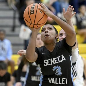 Seneca Valleys Makayla Canty scores past North Alleghenys Maddie Williams on Wednesday. (Christopher Horner | TribLive)