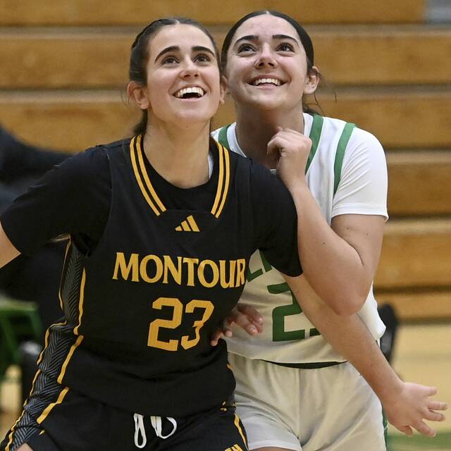 Montours Zoe Woessner boxes out South Fayettes Alaina Clingan on Thursday at South Fayette. (Christopher Horner | TribLive)