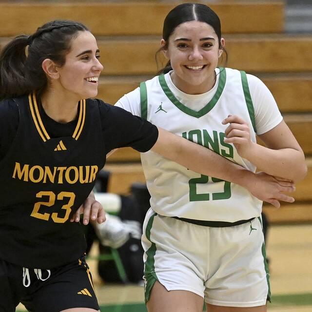 Montour’s Zoe Woessner boxes out South Fayette’s Alaina Clingan during their game on Thursday, Dec. 18, 2025, at South Fayette. (Christopher Horner | TribLive)