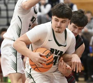 Belle Vernons Anthony Dicenzo (front) battles Greensburg Centrals Joseph Foss for a loose ball during their game Saturday. The Leopards entered the WPIAL Class 4A rankings this week. (Christopher Horner | TribLive)