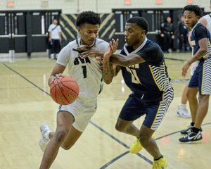 Belle Vernons Curtis Wade drives against Farrells Dorian Cain during the PIAA Class 4A first round last season. (Jenn Codeluppi | Mon Valley Independent)