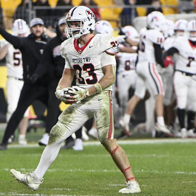 Peters Townships James Spratt celebrates after recovering a Pine-Richland fumble late in the WPIAL Class 5A championship game on Saturday, Nov. 22, 2025, at Acrisure Stadium. (Christopher Horner | TribLive)