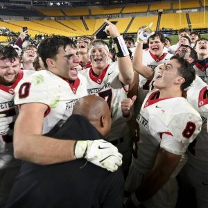 The Peters Township football team celebrates after defeating Pine-Richland in the WPIAL Class 5A championship game on Saturday, Nov. 22, 2025, at Acrisure Stadium. (Christopher Horner | TribLive)