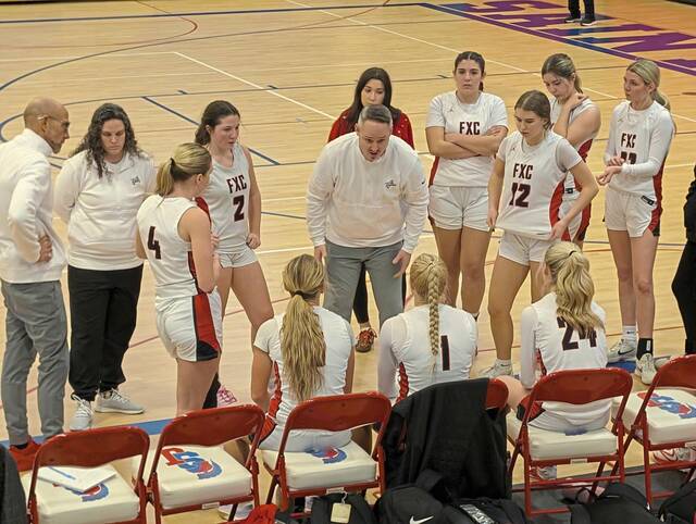 Fox Chapel coach Marty Matvey talks to his team against Neshannock at the St. Joseph tournament Monday. (Michael Love | TribLive)