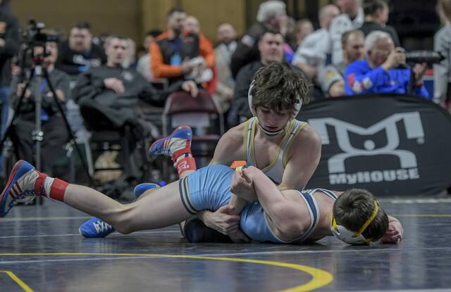 Butlers Santiono Sloboda wrestles Connor Lenahan of Council Rock South during the 2024 PIAA tournament. (Louis B. Ruediger | TribLive)