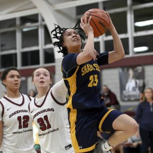 Shady Side Academy’s Karis Thomas scores past Greensburg Central’s Avery Jones (31) and Jayla Peterson during their game on Monday, Feb. 3, 2025, at GCC.