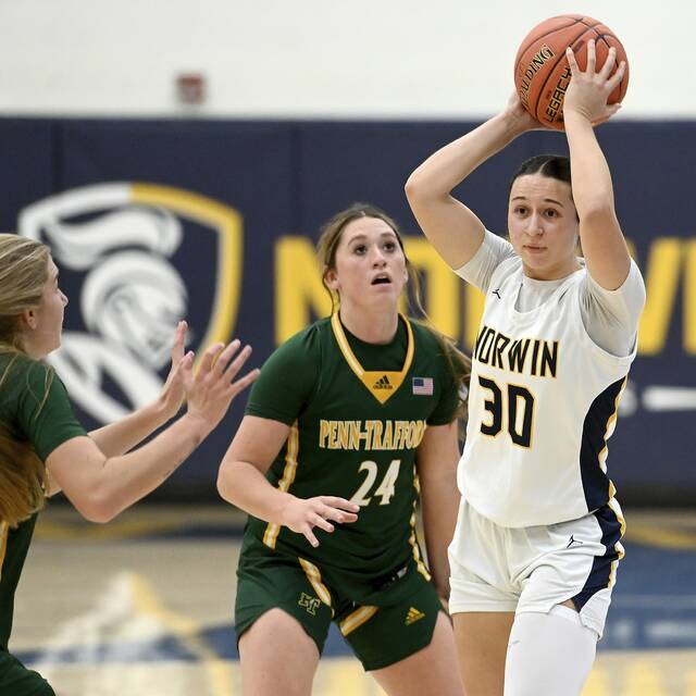 Norwins Ava Christopher works against Penn-Traffords Torrie Destefano during their game last month. (Christopher Horner | TribLive)