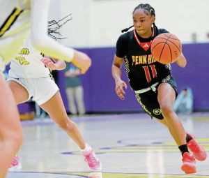 Penn Hills senior guard Milani Oliver drives against Plum on Jan. 5. (Josh Rizzo | For TribLive)