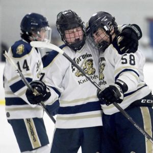 Norwins Cal Costantino (center) celebrates with Aaron Varrati after scoring in a 2004 playoff game against Fox Chapel. (Christopher Horner | TribLive)