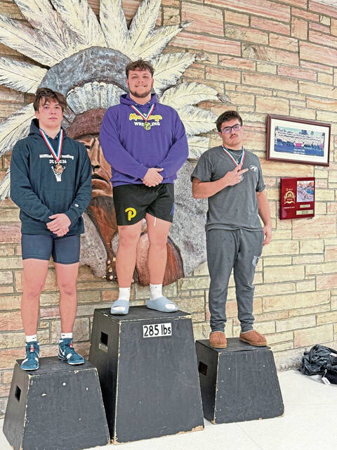 9179189_web1_pal-Plumboyswrestling3-011526