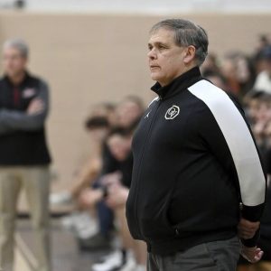 Quaker Valley coach Mike Mastroianni watches from the bench during a 2024 game against Avonworth. (Christopher Horner | TribLive)