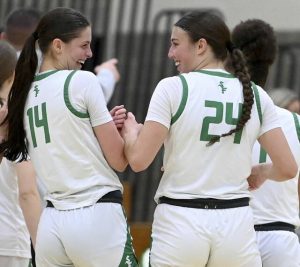 South Fayettes Juliette Leroux (14) celebrates with Ryan Oldaker after scoring her 1,000th career point during the Lady Lions game against Norwin on Saturday, Jan. 10, 2026, at South Fayette. (Christopher Horner | TribLive)