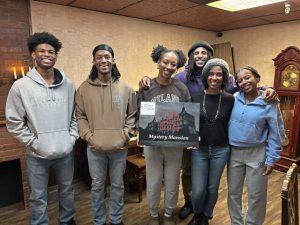 Former Pitt basketball standout Julius Page (back) is joined by his family, from left, Julius Page Jr., Julian, Perri, wife Kenisha and Julianna. (Submitted by Julius Page)