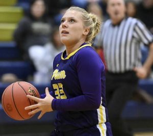 Plums Riley Stephans scores against Kiski Area on Dec. 8, 2025. (Christopher Horner | TribLive)
