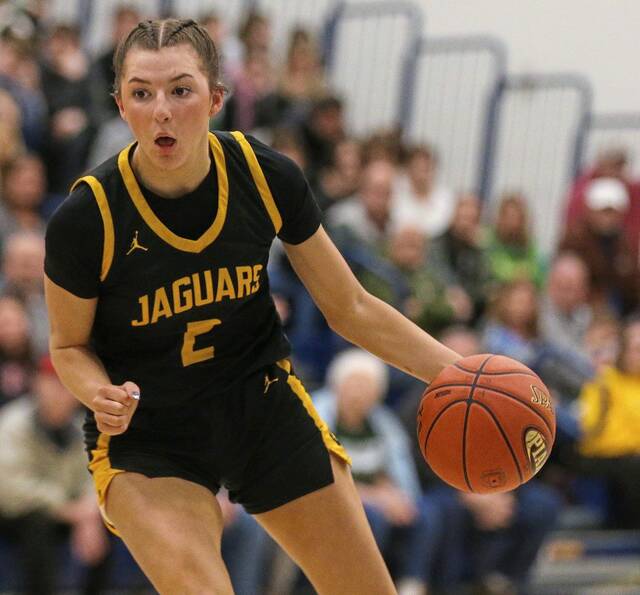 Thomas Jeffersons Riley McCabe handles the ball against Penn-Trafford in the 2025 WPIAL Class 5A quarterfinals. (Mike Darnay | Mon Valley Independent)