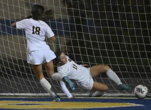 Quaker Valleys Maddie Gatehouse makes a save against Freeport during a WPIAL Class 2A soccer semifinal Oct. 28, 2025 at Hampton.