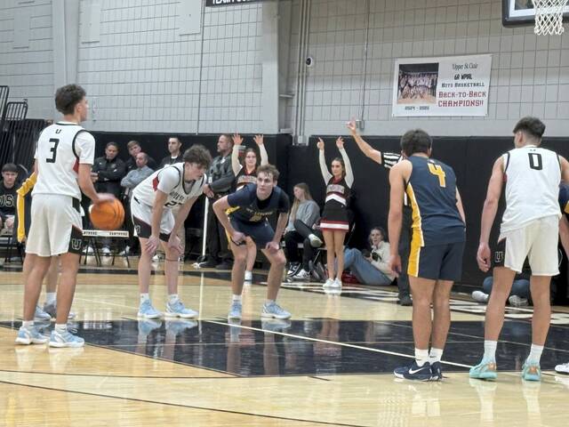 Upper St. Clairs Jake Foster shoots a free throw against Mt. Lebanon on Tuesday. (Don Rebel | TribLive)