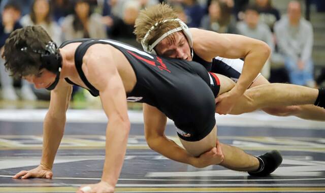 Kiski Areas Gavin Murphy takes down Indianas Sean Parks during their 133-pound match Dec. 10, 2025, at Kiski Area. (Josh Rizzo | For TribLive)