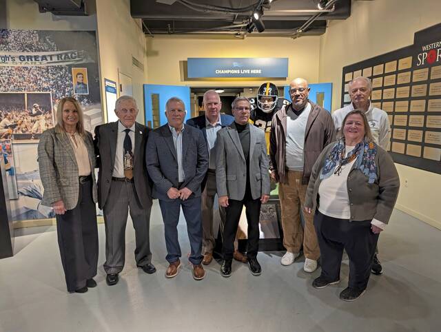 Members of the WPIAL Hall of Fame Class of 2026 were announced Jan. 14, 2026, at the Western Pennsylvania Sports Museum at the Sen. John Heinz History Center. From left, are Tricia Alderson, Charlie Hunnell, Phil Mary, Tim McConnell, Joe Salvino, Gregory Whitehead (father of Jordan Whitehead), Anne Madarasz, and Terry Borkovic (2004 Hopewell girls volleyball team). (Michael Love | TribLive)