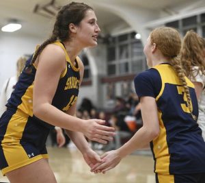 Shady Side Academys Cassie Sauer celebrates with Morgan Kane after she scored against Greensburg Central Catholic on Jan. 8 at GCC. (Christopher Horner | TribLive)