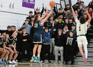Franklin Regionals Logan Walter hits a 3-point shot against Penn-Trafford on Friday. (Chaz Palla | TribLive)