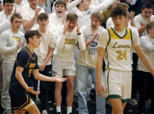 Freeport's Carson Kane gestures after a ball was thrown out of bounds Friday during a section game with Deer Lakes. (Josh Rizzo | For TribLive)