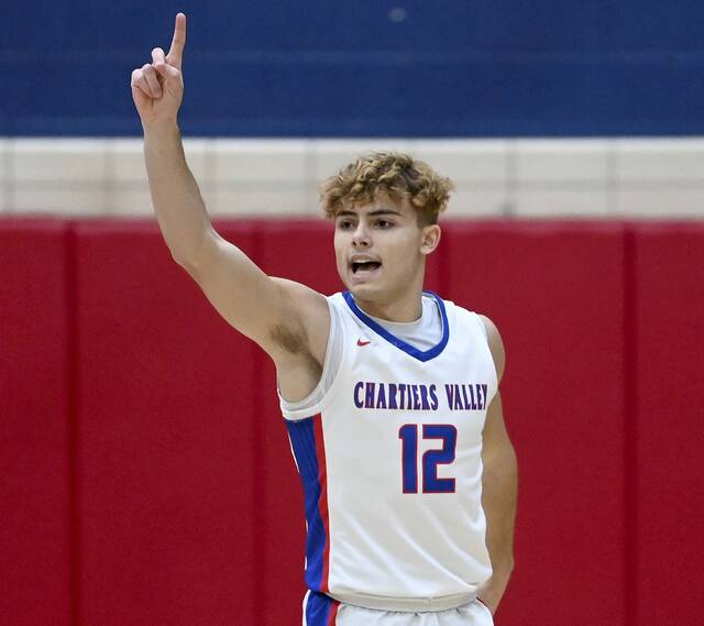 Chartiers Valleys Julian Semplice celebrates after hitting a 3-pointer during the first quarter against Allderdice on Wednesday. (Christopher Horner | TribLive)