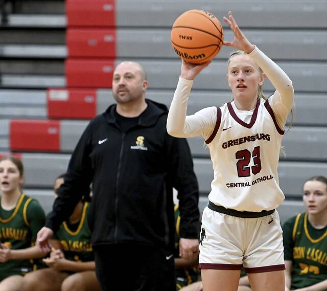 Greensburg Centrals Erica Gribble shoots a 3-pointer against Seton LaSalle on Tuesday, Dec. 30, 2025, at the North Catholic holiday tournament in Cranberry. (Christopher Horner | TribLive)