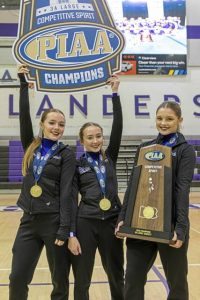 The 2025-26 PIAA champion Baldwin competitive spirit cheer team includes captains, from left, senior Keira Kozak, senior Carly Dowhy and junior Cali Chraska. (Courtesy of Ethan Green)