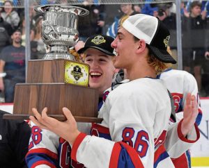 Chartiers Valleys Tyler Held holds the Penguins Cup after beating Greensburg Salem in overtime in 2024. (Chaz Palla | TribLive)