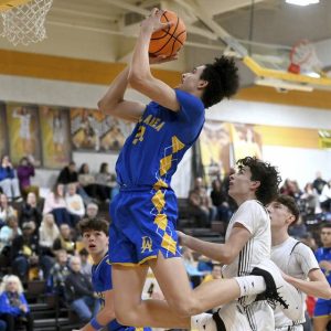 Derry’s Stanley Rajkovich scores his 1,000th career point during the third quarter on Tuesday, Jan. 20, 2026, at Greensburg Salem. (Christopher Horner | TribLive)