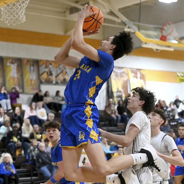 Derry’s Stanley Rajkovich scores his 1,000th career point during the third quarter on Tuesday, Jan. 20, 2026, at Greensburg Salem. (Christopher Horner | TribLive)