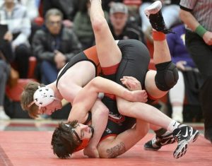 Bethel Parks Ian Bucheli beats Fox Chapels Adam Haines in the 145-pound bout during the Allegheny County wrestling championship Jan. 17 at Fox Chapel Area High School. (Chaz Palla | TribLive)