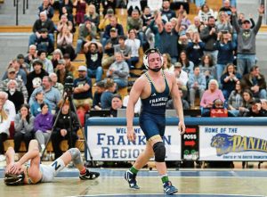 Franklin Regionals Cohen Buccicone pins Norwins Evan Suedhoff during the 160-pound bout Wednesday. (Chaz Palla | TribLive)