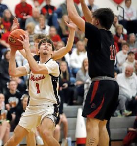 Mohawks Bobby Fadden attempts to get a shot past Southmorelands Ty Whoric last season. (Josh Rizzo | For TribLive)